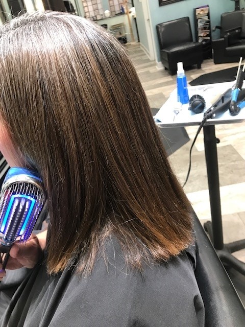 japanese hair straightening on long brown hair in Cincinnati