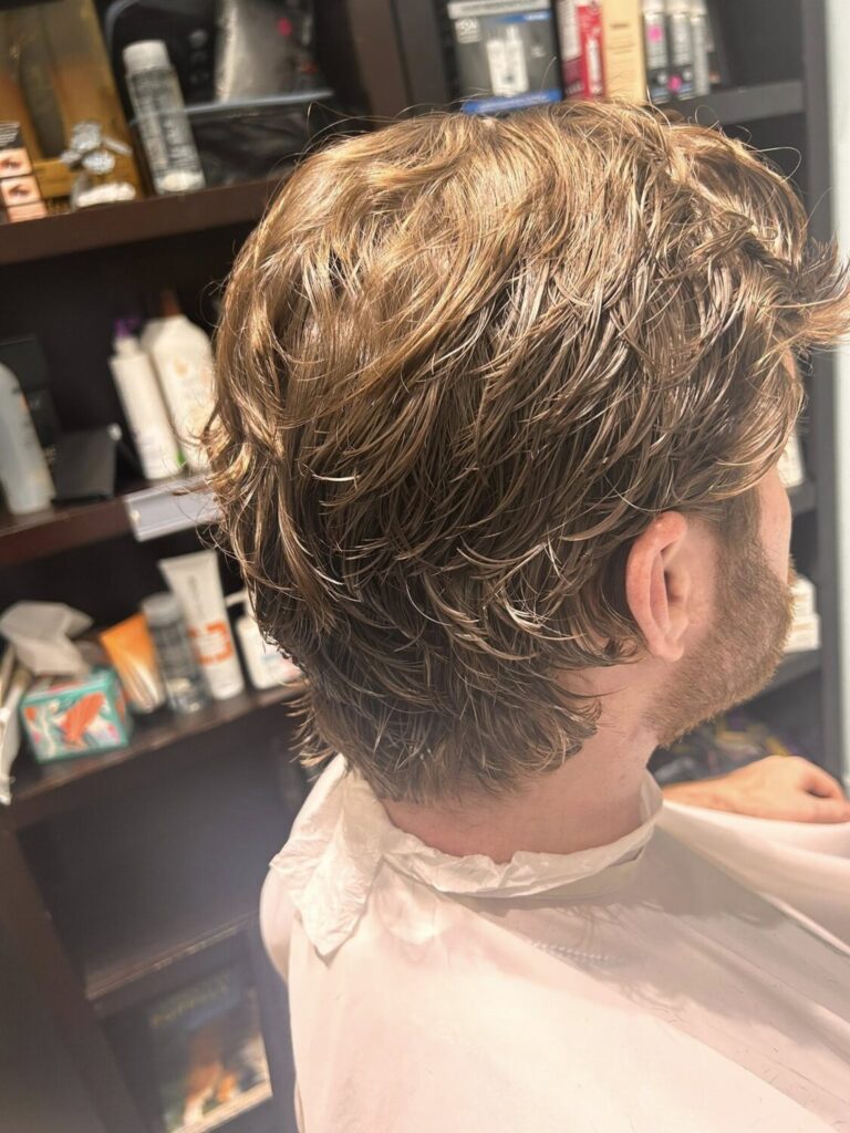 man with short hair with body wave